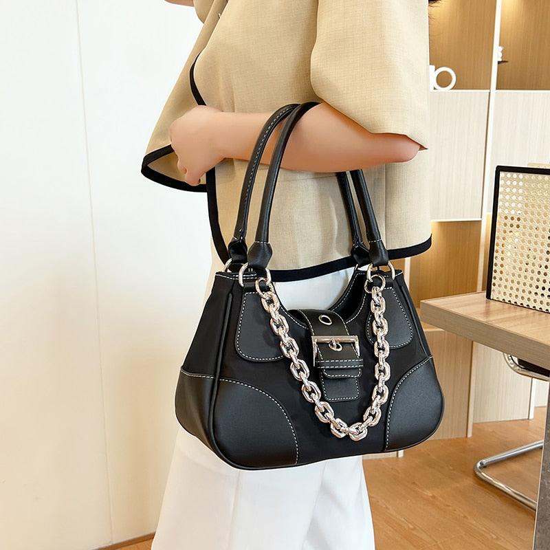 Make a Statement with Canvas Splicing Shoulder Bags in Patent Leather and Chain