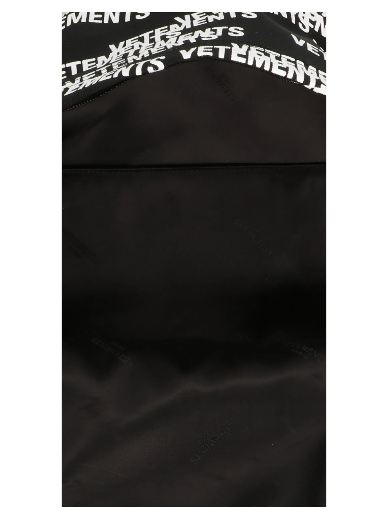 Vetements Allover Logo Printed Zipped Backpack